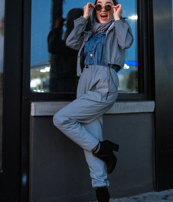 Woman in a dynamic pose, feeling energetic and full of life.